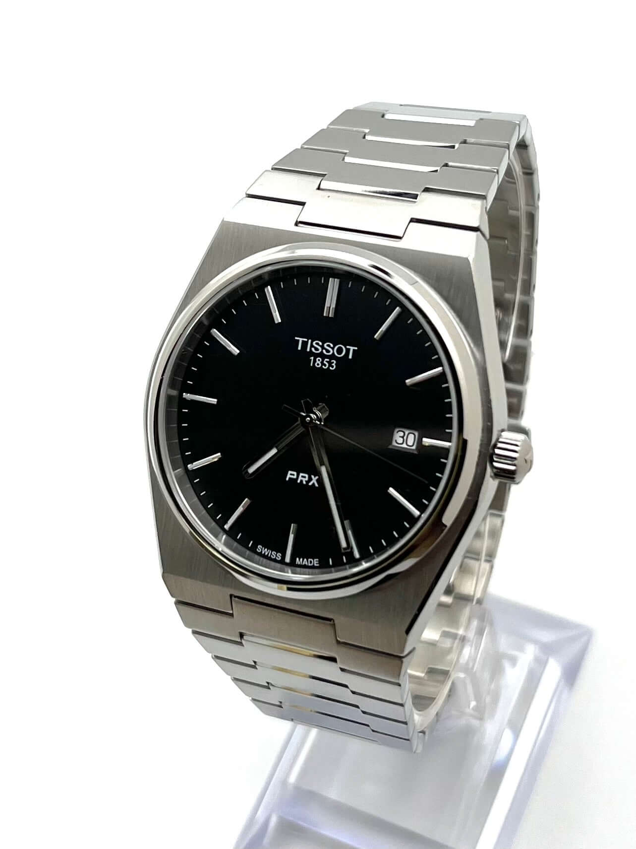 Tissot PRX Quartz T137.410.11.051.00 men’s 40mm stainless steel watch with black dial, date display, sapphire crystal, and 100m water resistance