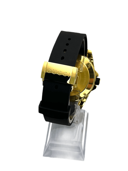Gucci Dive YA136219 men’s 45mm gold PVD stainless steel watch with black rubber strap, ceramic bezel, black dial, sapphire crystal, Swiss quartz, 200m water resistant
