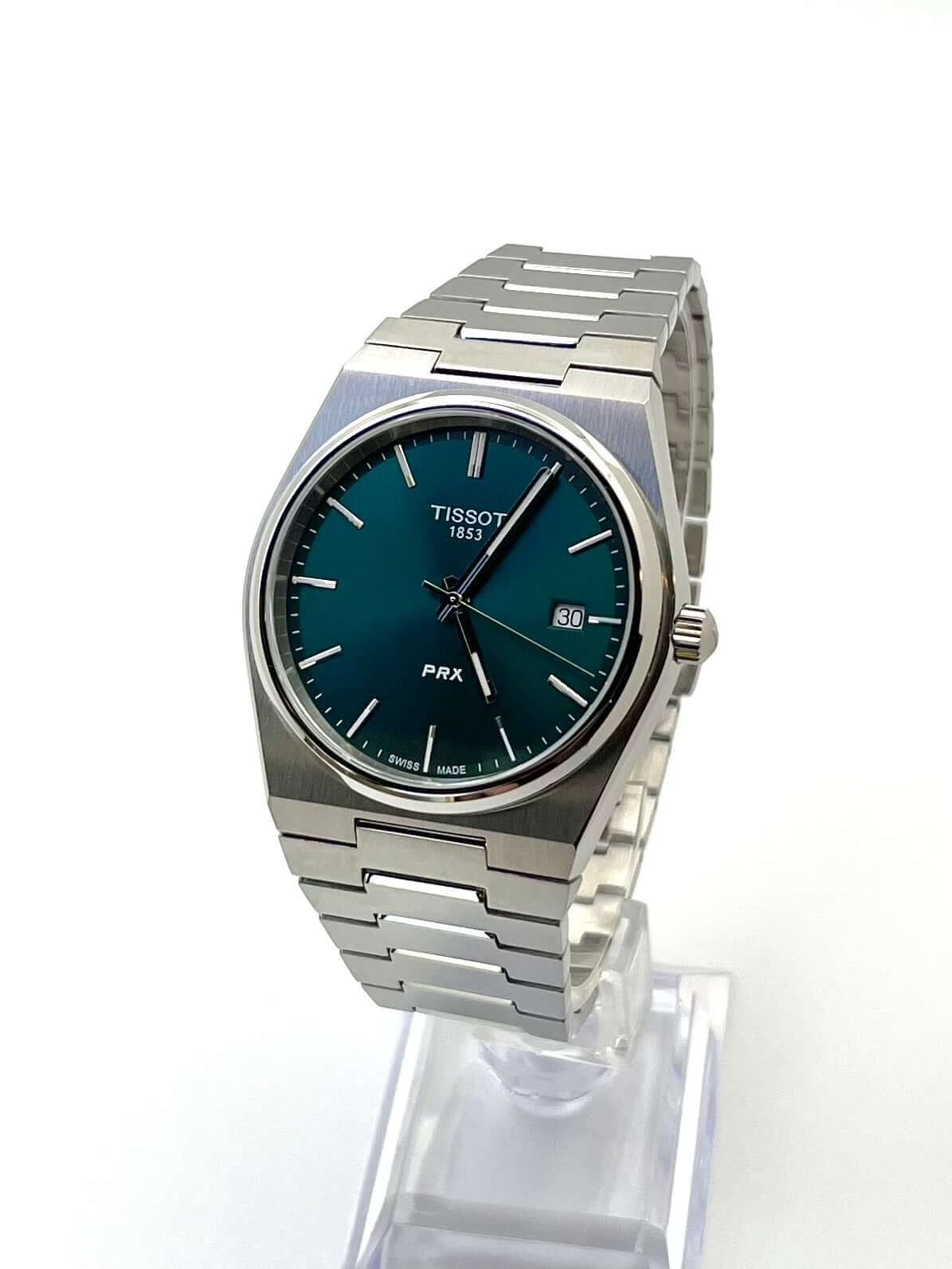 Tissot PRX Quartz T137.410.11.091.00 40mm stainless steel men’s watch with green dial, date display, sapphire crystal, and 100m water resistance