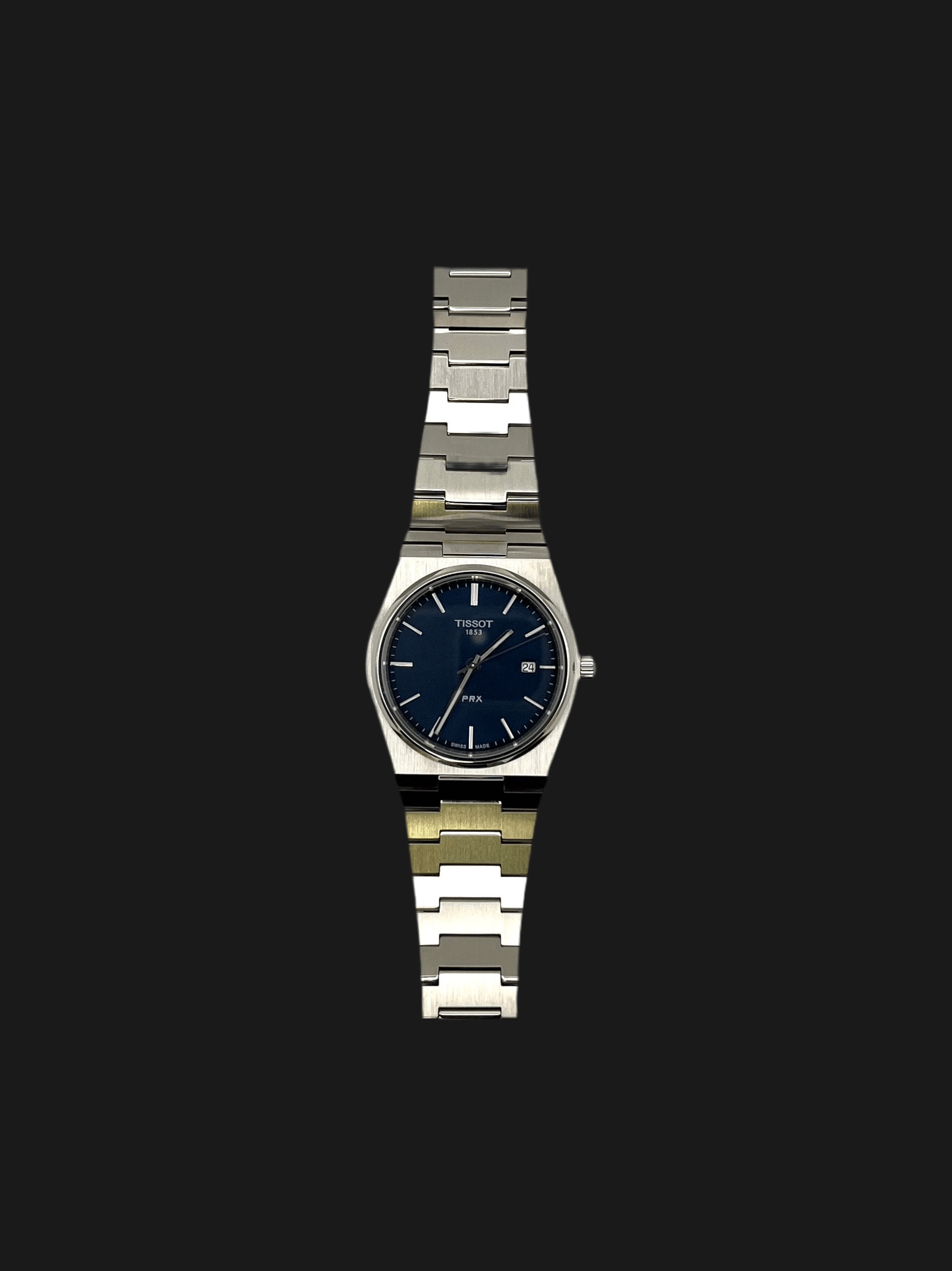 Tissot PRX Quartz T137.410.11.051.00 40mm stainless steel men’s watch with black dial, date display, sapphire crystal, and 100m water resistance