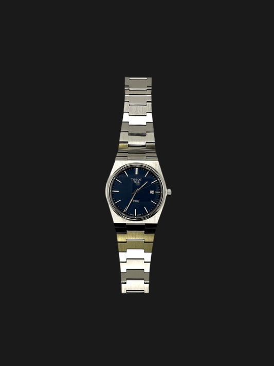 Tissot PRX Quartz T137.410.11.051.00 40mm stainless steel men’s watch with black dial, date display, sapphire crystal, and 100m water resistance