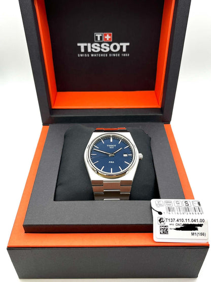 Tissot PRX Quartz T137.410.11.051.00 40mm stainless steel men’s watch with black dial, date display, sapphire crystal, and 100m water resistance